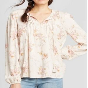 Knox Rose. Pale blush pink floral patterned blouse with tassels